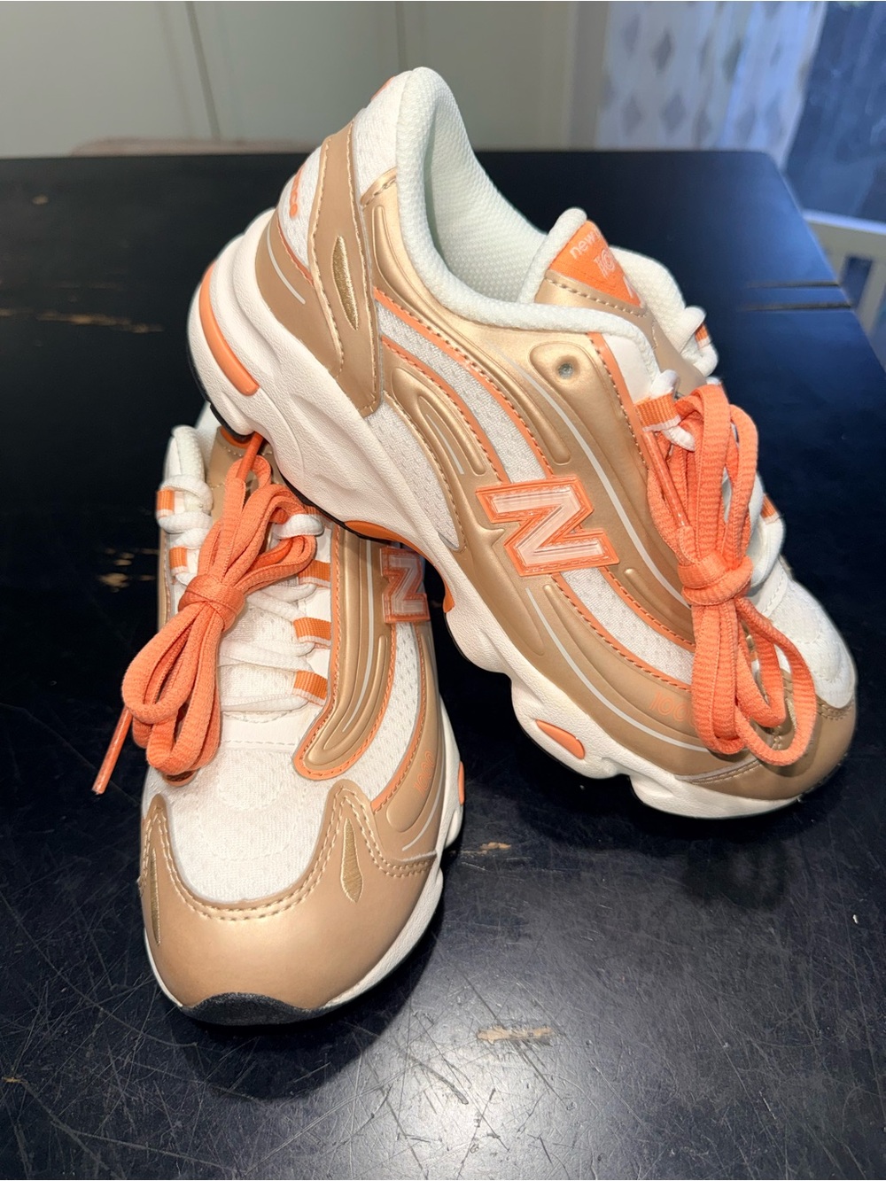 New Balance 1000 Kids size 3 brown and orange color way